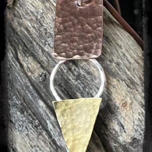Mixed metal, copper silver, and brass pendant