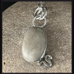 Ocean polished beach pebble and sterling silver pendant