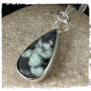 Natural green emerald and sterling silver pendant