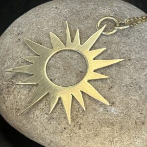 Brass sun pendant