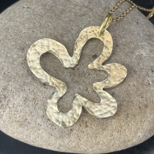 Polished brass pendant